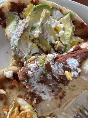 1 Baleada (flour tortilla filled w refried beans, Honduran cream, sliced avocado & hard boiled egg, crumbled farmer cheese