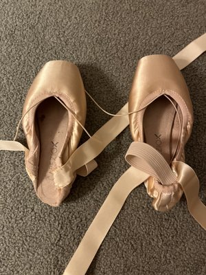 My pointe shoes that I achieved here at NewSteps!