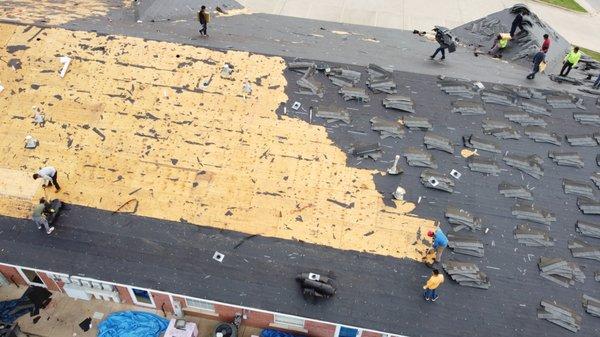 Tear off existing roof to the deck.