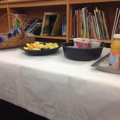 Coffee, OJ, yogurt, bagels w/cream cheese, wild blueberry muffins and fruit cocktail!