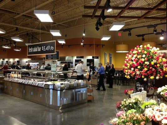 The large deli has a seating area for dining in. That's the floral dept to the right.