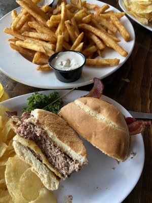 Thick cut bacon cheeseburger with Gouda cheese, cooked medium.