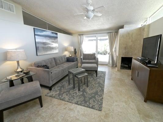 This comfy sofa at Casa Aralia is a great spot for watching tv or relaxing by the fireplace.