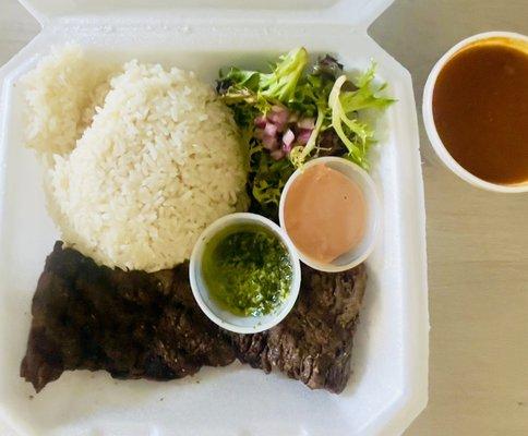 Churrasco with salad, rice and beans