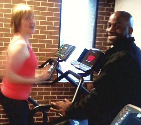 Personal trainer James Lewis with client.