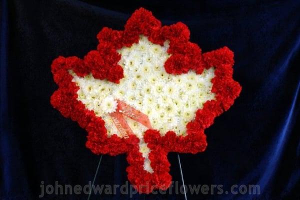 We made this custom maple leaf arrangement for a Canadian man's memorial service.