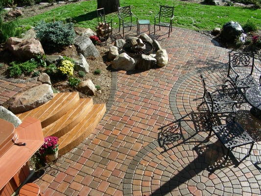 Wonderful Back Yard Landcape is the perfect getaway with patio, hot tub and fire pit.