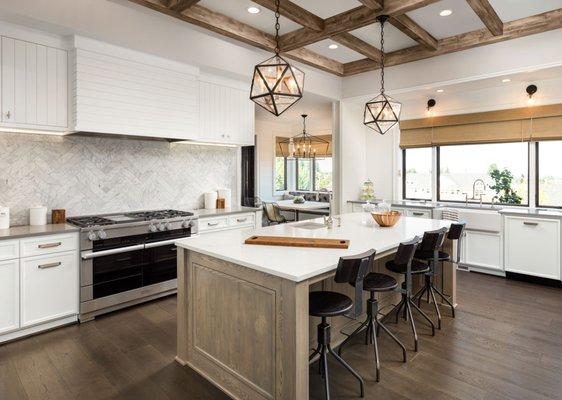 Captivating kitchen remodel. Premium wood ceiling beams, marble wall tile, and exquisite cabinets. Rustic elegance redefined.