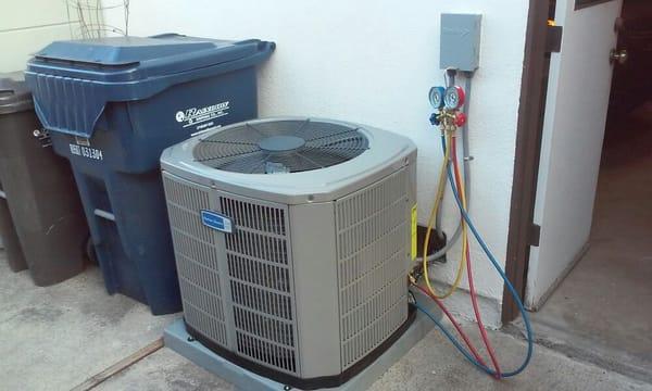 Newly installed 2.5 ton American Standard condensing unit on 3" pad.