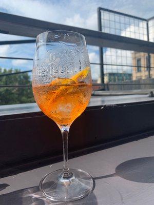 Half an Aperol Spritz on tap