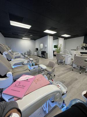 Lots of pedicure chairs