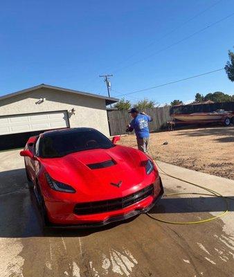 Car being washed by mobile Carwash people