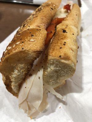 Sub shop's medium everything hoagie with turkey, provolone and sweet peppers