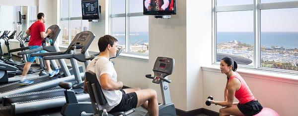 The fitness center at Adler Place condos, complete with a sauna and hot tub along with an outdoor rooftop pool and sundeck.