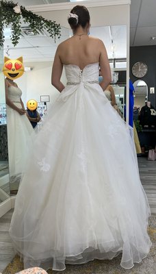 Second fitting, showing me what the bustle in the back would look like