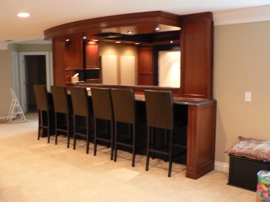 Custom cherry home theater with 14' screen by HS.