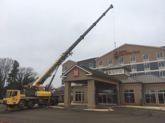 Putting up letters at the hotel in Statesville, NC