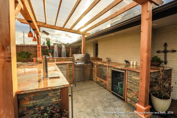 Outdoor kitchen provides a year-round comfortable place for entertaining.