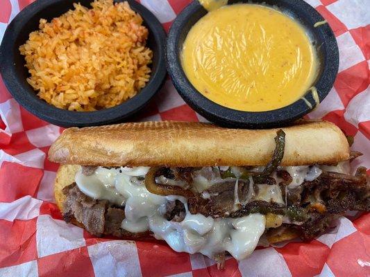 Philly cheesesteak, dirty rice, queso.