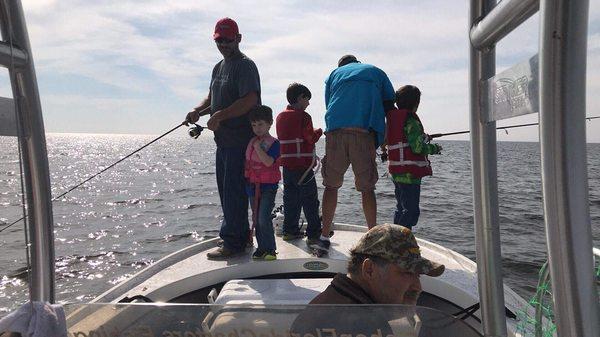 Captain Woody helping kids cast and catch