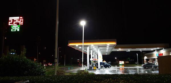 Shell station at night. Well lit.