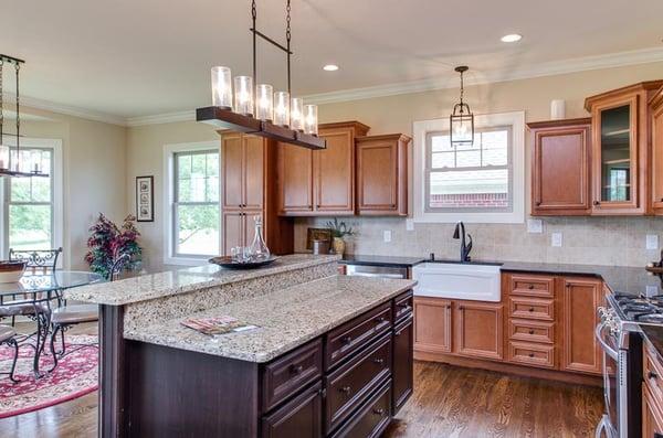 This Kitchen is part of an open floor plan that boasts beautiful views overlooking Cherry Blossom Golf Club.