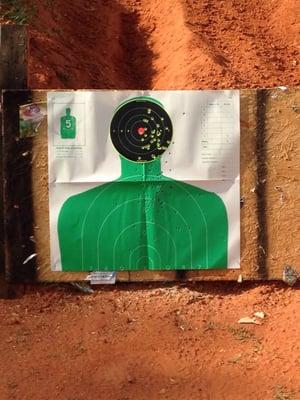 This was my wife's result of shooting her AR15 from 50yds. Not bad, huh?