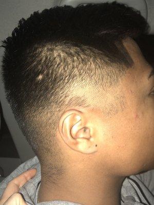 Terrible cut. He also added a Bunch of black waxy stuff to make it "look" like it was a good edge up. Also charged $40.