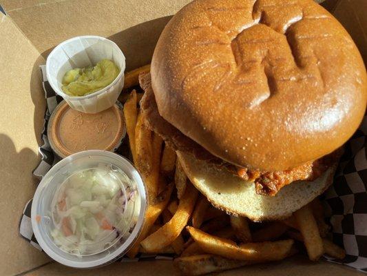 sammich on a box full of battered fries