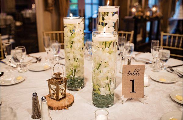 Wedding Centerpieces, Floating candles and Orchids