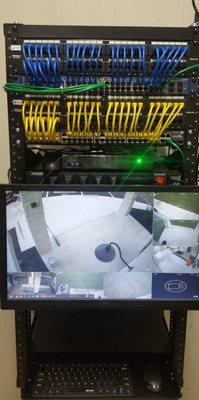 Wall mounted relay rack for customer with smaller budget.  Voice, Data and Video.