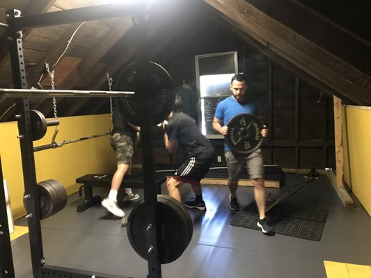 Check out the chains holding the bar for the bench press.  Doesn't get any more old school then our power barn.