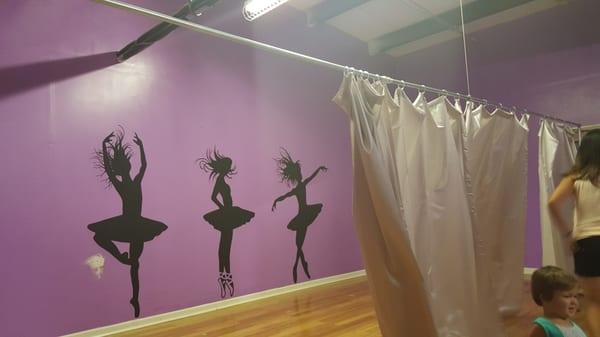 The so called dance recital stage with it's curtain made up of 4 window curtains.