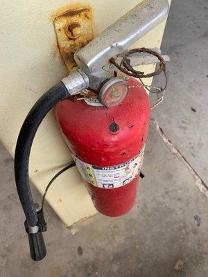 Gas pumps with OOC fire extinguishers.