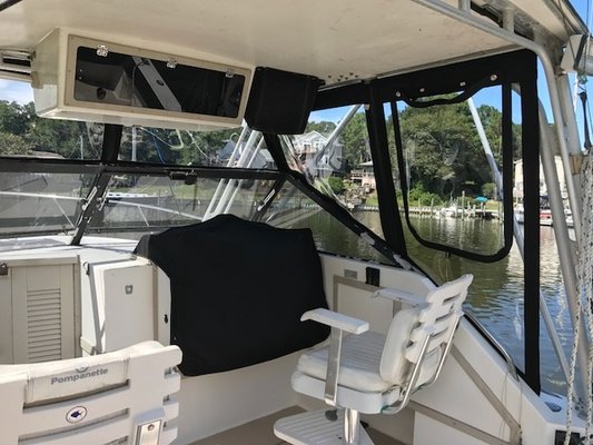 Clear vinyl and Sunbrella helm enclosure