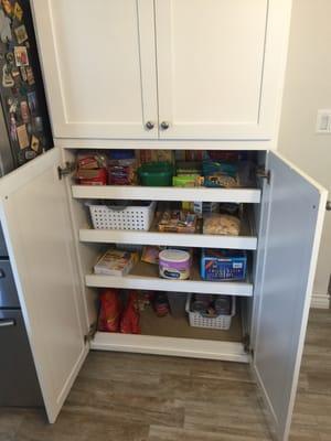 American craftsman Mission style pantry with white varnish finish and pull out shelves. Self close soft close doors.