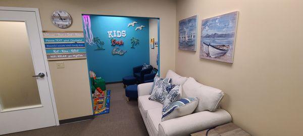 Comfortable Waiting Room with attached Kid's Oasis / Reading / Play Area