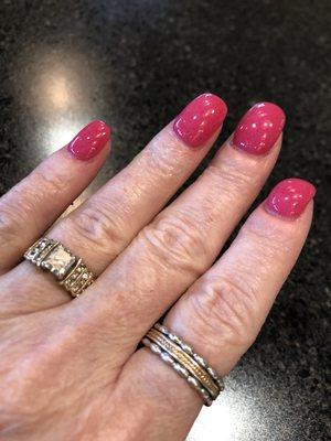 Powder dip nails in pink with a bit of glitter.