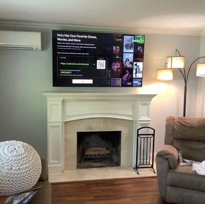 Tv mounting over the fireplace