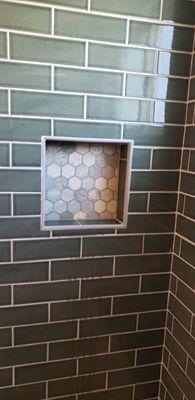 Bathroom tiling and niche. We can customize your bathroom and install tiles the right way.