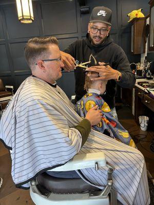 Brandon giving my son a snazzy haircut!