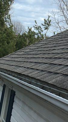 The roof is sagging, just follow the lines of the shingles across.