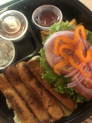 Vegan hot dog inside of a vegan Coco bread.