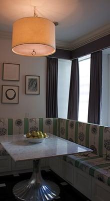 Custom banquet seating area in an eat-in kitchen.