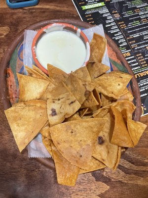 Freshly made chips and queso