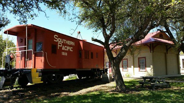 The library is in the old train station  and they have a caboose out front