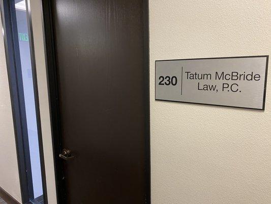 Tatum McBride Law, P.C. door sign.