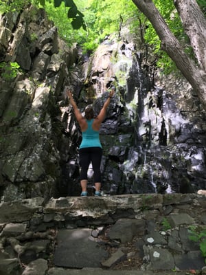 mountain pose by the waterfall