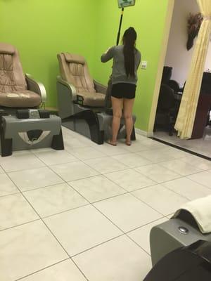 Using the pedicure basin as a mop bucket?!