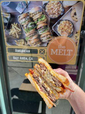 Noshery x The Melt patty melt with Grilled Angus & Wagyu beef patty, sweet, caramelized onions, melted swiss and provolone cheese